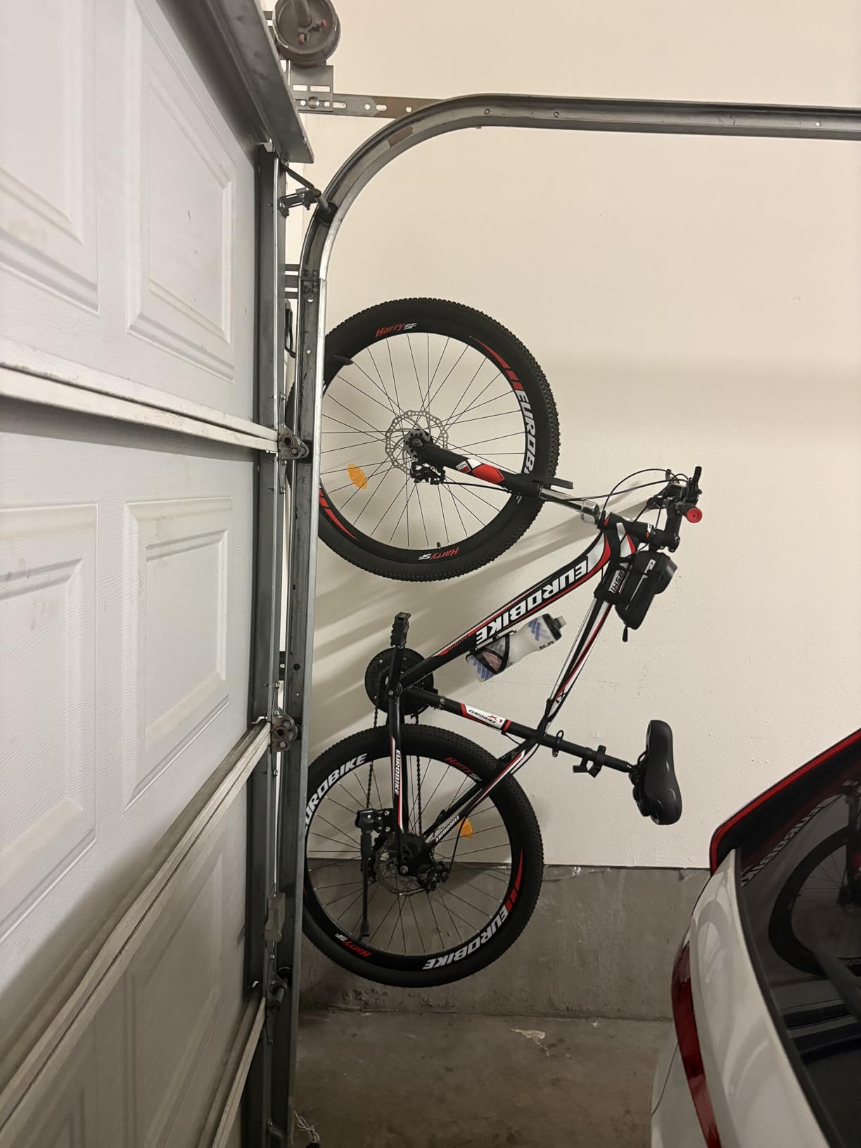Housolution Bike Wall Mount with Fixed Hook, [4 Pack] Bike Storage Rack | Bike Rack Vertical Stand for Garage - Easily Hang/Detach - with Screws Iron Bike Hanger Brackets customer photo 2