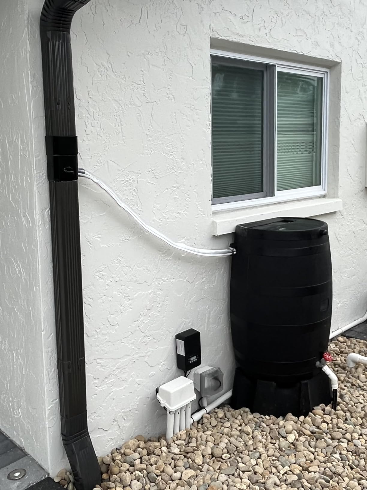 RTS Home Accents 50-Gallon ECO Rain Barrel Made with 100% Recycled Plastic, Flat Back Rain Water Collection Barrel, Stand Included, Black customer photo 1