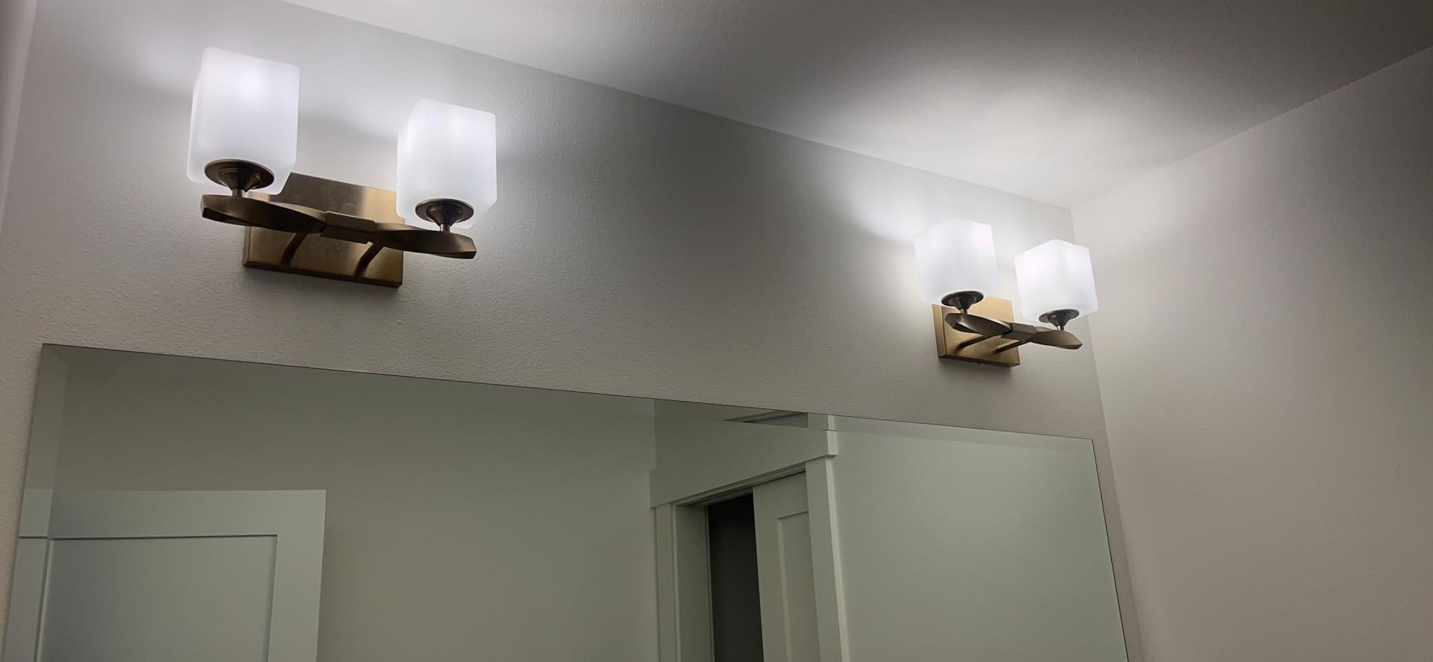 Kichler Marette 3-Light Bathroom Vanity Light, Champagne Bronze | Satin etched cased opal glass vanity light for bathrooms and powder rooms (23