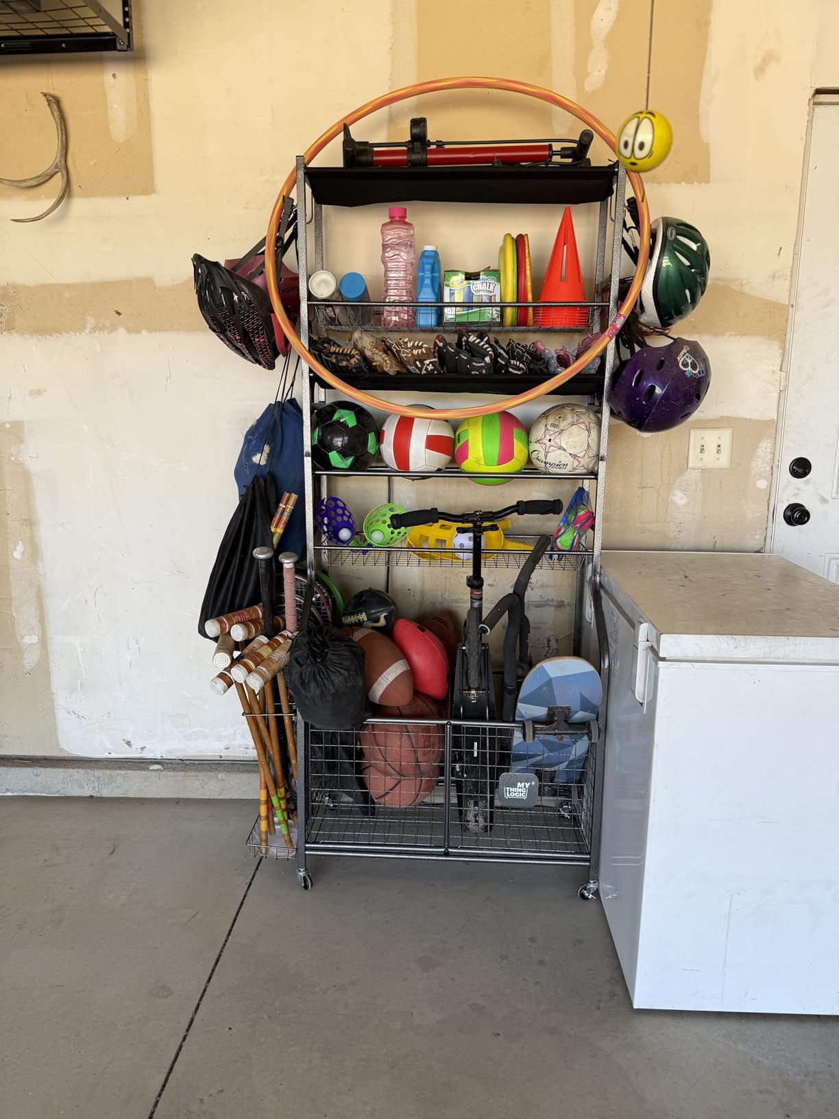 Mythinglogic Rolling Sports Equipment Organizer for Garage Gear and Toys | Metal rolling organizer stores balls, bats, rackets, helmets, bags and outdoor toys in separate bins, baskets and hooks customer photo 2