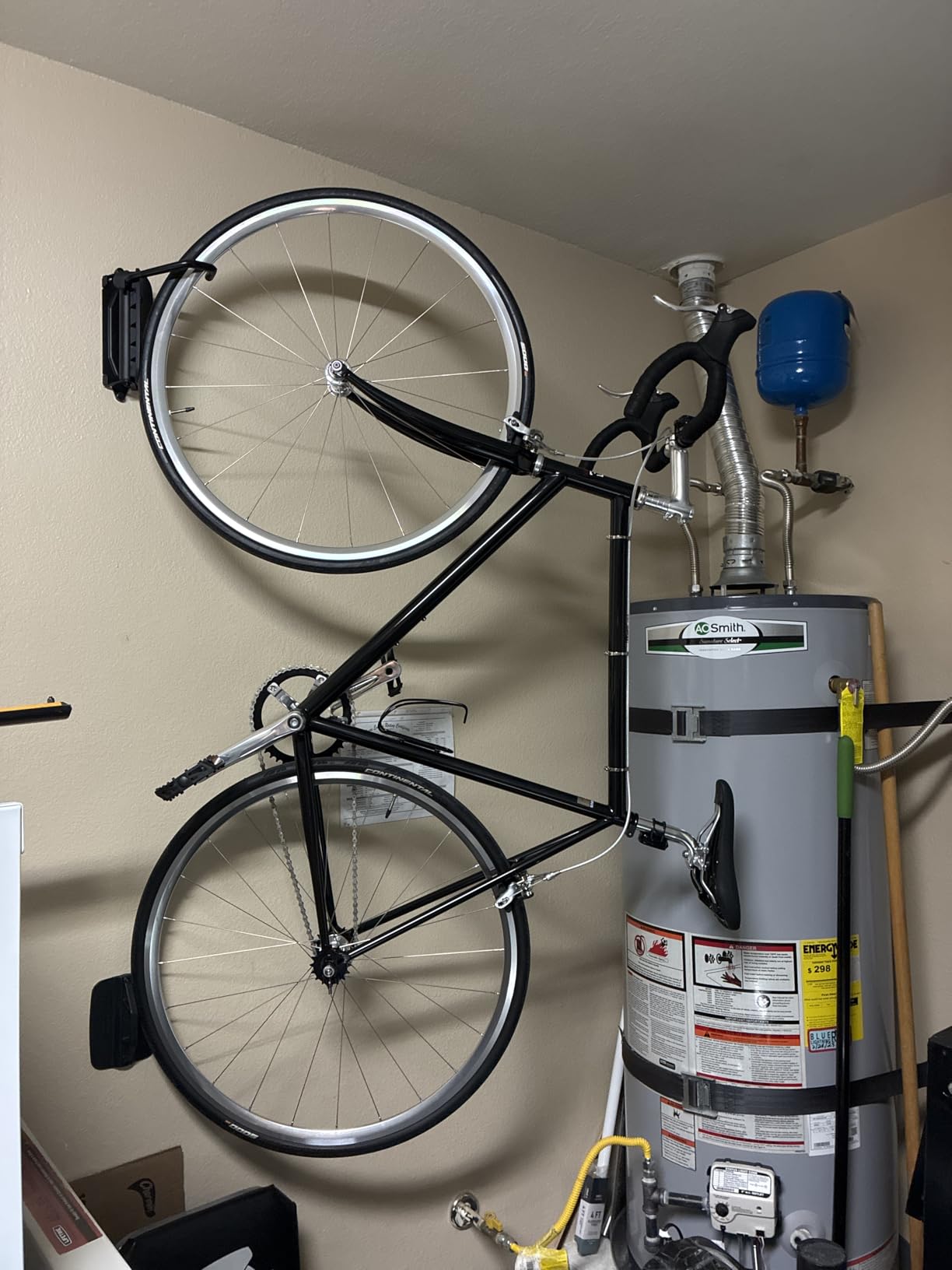 monTEK Swivel Bike Wall Mount, Bike Hangers for Garage, 4 Pack | Heavy-duty vertical wall bike storage rack swivels 150° to save space; holds 66 lb each and fits tires up to 3.54 in wide customer photo 2