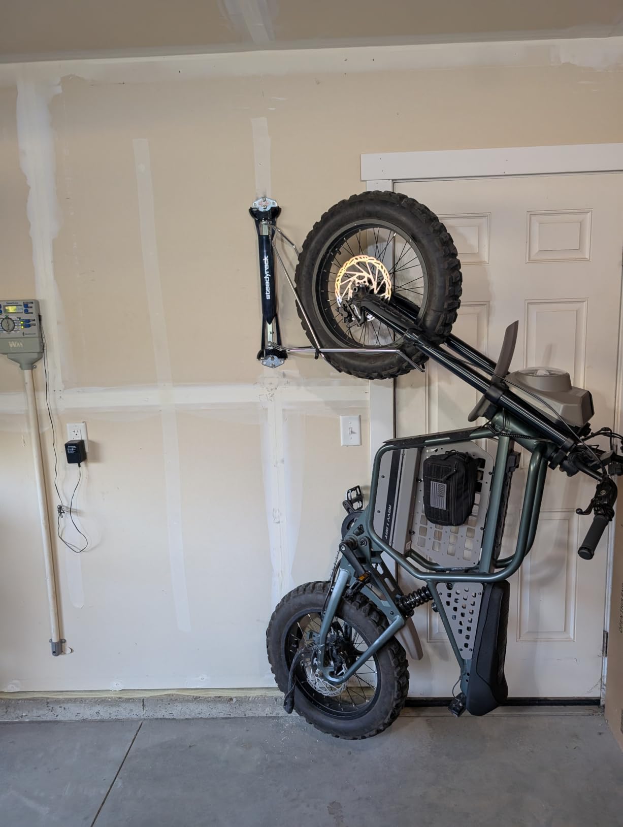 Steadyrack Swivel Bike Wall Mount, Vertical Mountain Bike Rack, Garage | Fits 24 to 29 in wheels and 2.1 to 2.8 in tires. Roll-in, no lift, holds mountain and gravel bikes to 77 lb. customer photo 1
