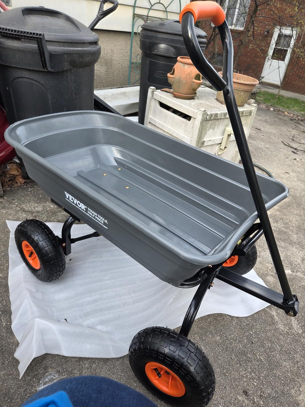 VEVOR Poly Garden Dump Cart 4 Cu.Ft. 600 lbs 4 Wheel Wheelbarrow Dump Wagon | For Orchard Farm, Adjustable Handle, Heavy Duty Yard Cart with 10 in All Terrain Wheels, Steel Frame & Quick Release System customer photo 1