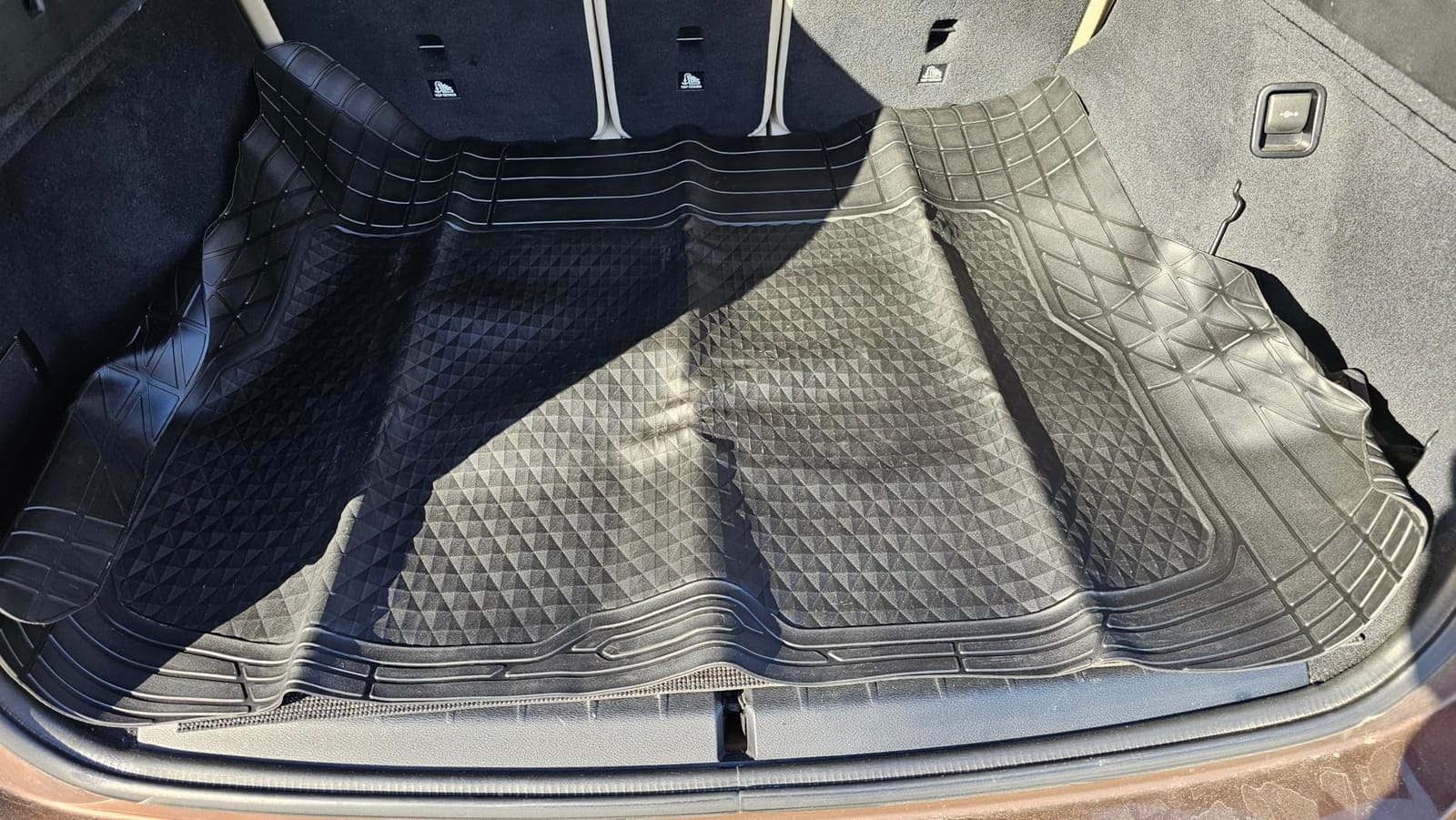 Amazon Basics Cargo Liner Floor Mat, All Weather Trunk Protection, Trimmable to Fit, Black customer photo 1