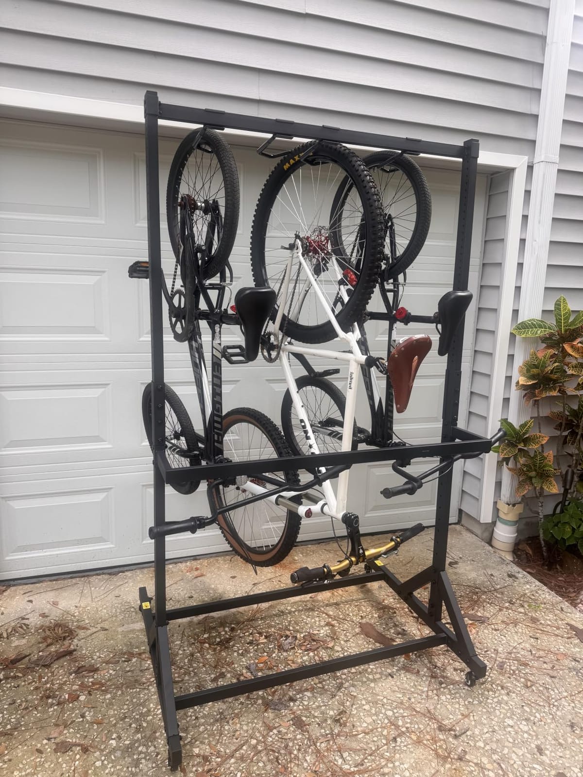 monTEK Rolling 4-Bike Rack Garage, Up to 4.5 in Tire Width | Heavy Duty, Holds up to 330 lbs, with 4 Bike Hooks and 6 Helmet Hooks, Bike Storage Rack with Locking Casters customer photo 2