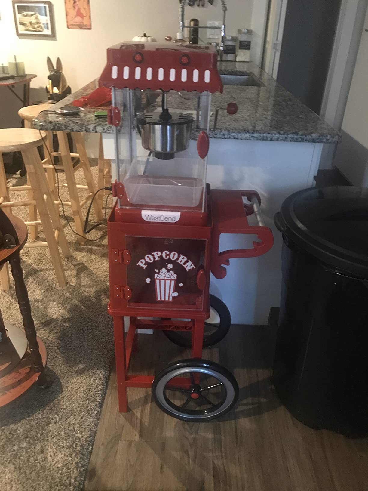 West Bend Popcorn Cart Vintage Theater Style with 2.5 oz Stainless Steel Kettle, Removable Serving Tray, Built-In Storage, Portable Design, 10 Cup Capacity, in Red/Silver customer photo 2
